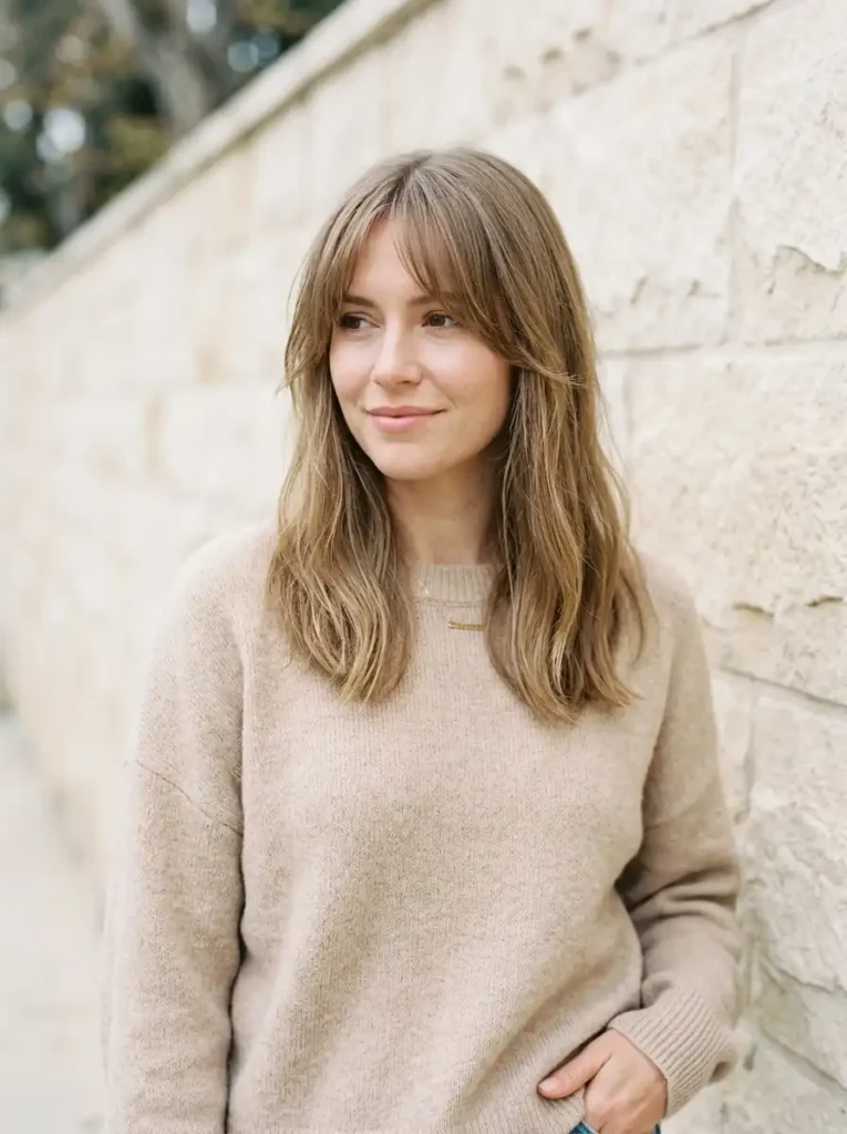 Airy curtain bangs on fine shoulder-length hair