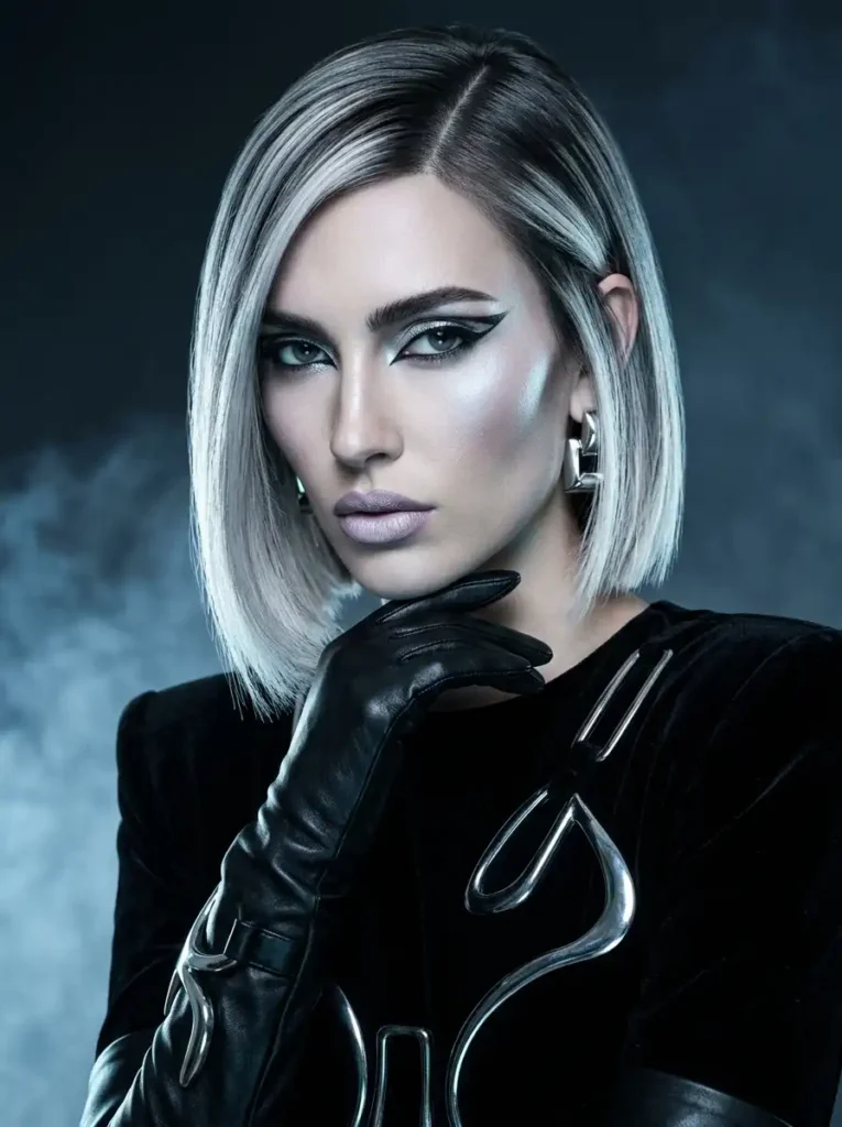 icy platinum balayage highlights with high contrast in an avant-garde editorial shot